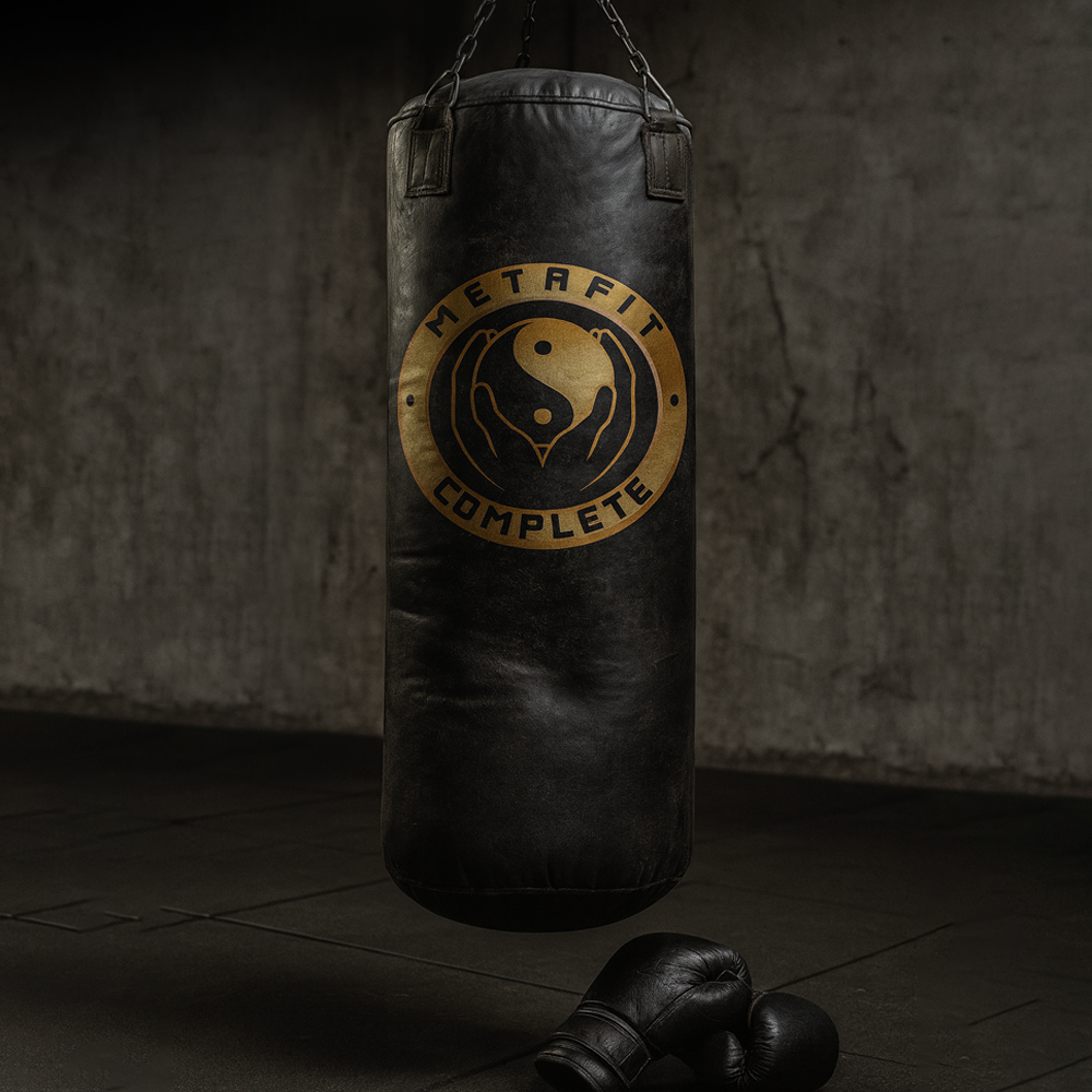 Main logo lockup for Metafit Complete featuring gold, black, and yin-yang symbolism on fitness gear
