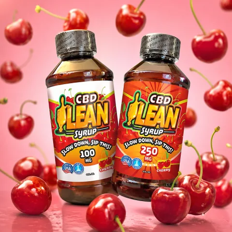 A promotional display of CBD Lean bottles arranged in a vibrant retail setting, featuring bold label designs with gradient backgrounds and stylized typography, emphasizing the product’s modern branding and shelf appeal.